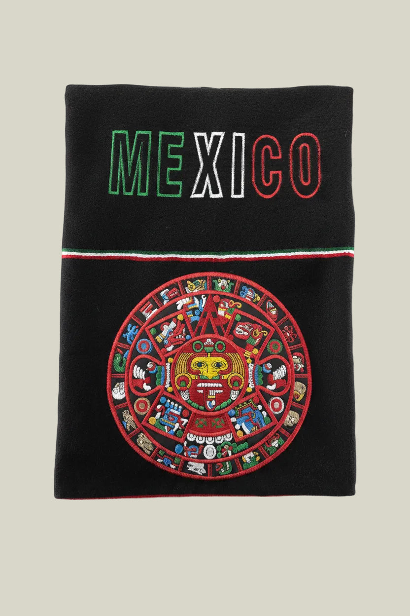 Mexican poncho, Aztec calendar poncho, heritage poncho, woven gaban, oversized poncho, artisan poncho, Mexican streetwear, embroidered poncho, cultural-inspired fashion, heavyweight poncho, festival poncho, traditional Mexican clothing, black woven poncho
