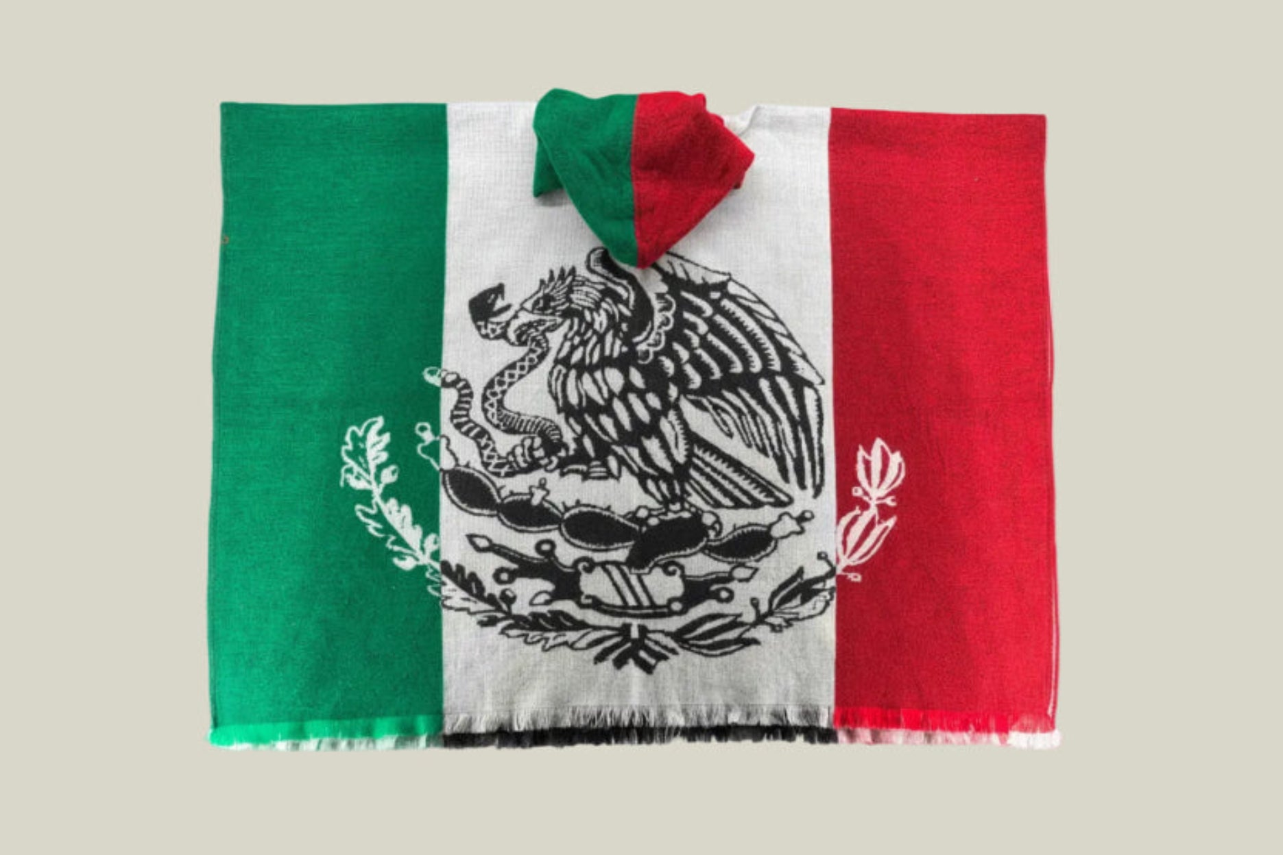Mexican poncho, heritage poncho, Mexican flag poncho, hooded baja hoodie, woven gaban, oversized poncho, Mexican streetwear, artisan poncho, heavyweight poncho, festival poncho, cultural-inspired fashion, tricolor poncho, traditional Mexican clothing
