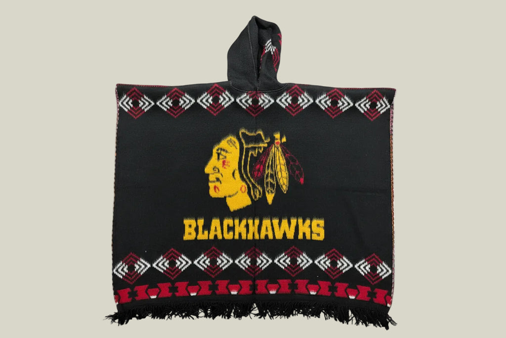 Chicago poncho, hockey-inspired poncho, black and red baja hoodie, hooded poncho, oversized poncho, woven gaban, artisan poncho, Chicago streetwear, sports-inspired hoodie, premium baja hoodie, geometric poncho, heavyweight poncho, game day streetwear