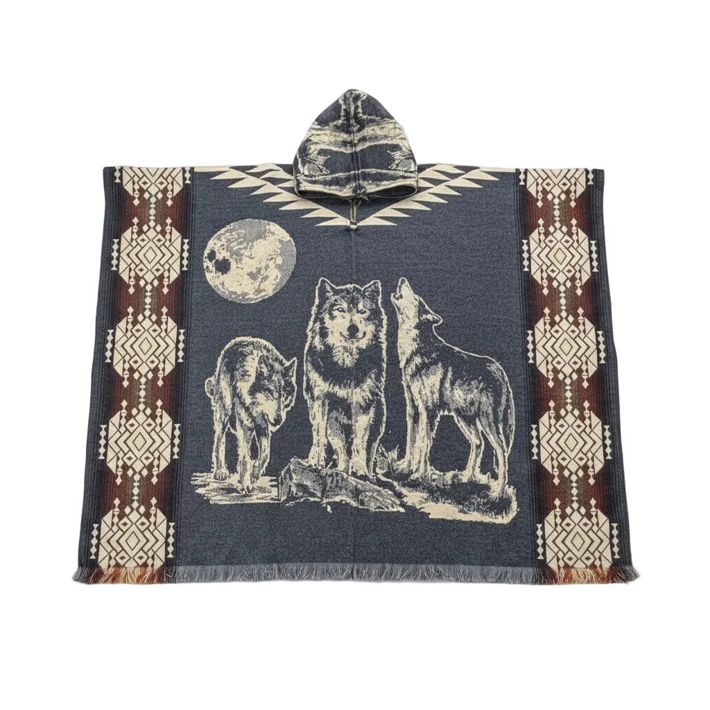 Premium rustic wolf hooded poncho featuring three wolves beneath a full moon with southwestern geometric patterns, woven artisan texture, fringe tassels, and traditional Mexican-inspired design in black, cream, and brown tones.